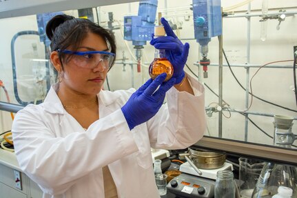 Spc. Mariel Gomez, far right, poses in a lab during her studies as a sustainable biomaterials major at Virginia Tech. (Courtesy Photo)