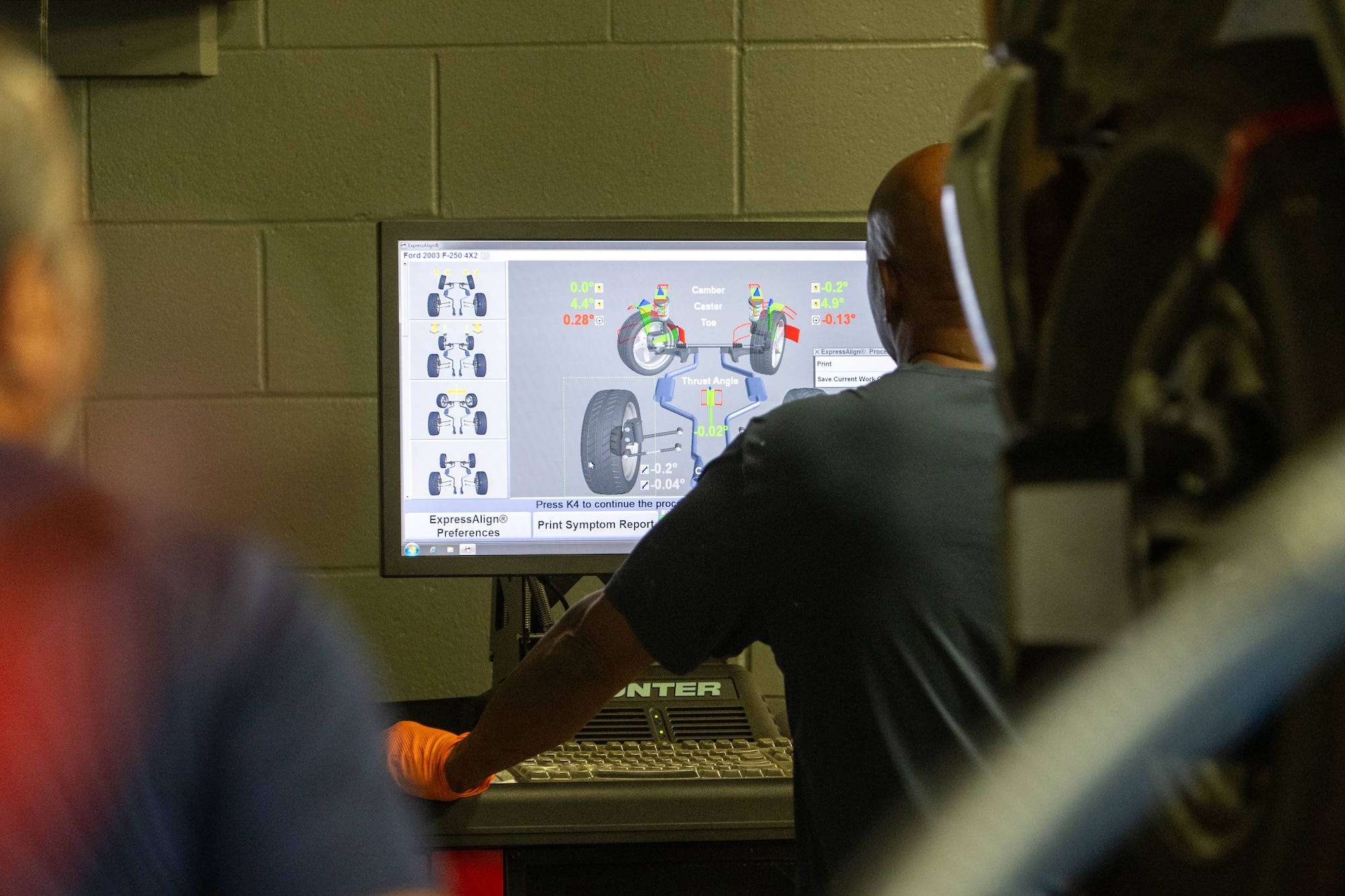 Michael Bailey, 1st Special Operations Force Support Squadron Auto Hobby manager, reviews an alignment report at Hurlburt Field, Florida, Oct. 29, 2024.