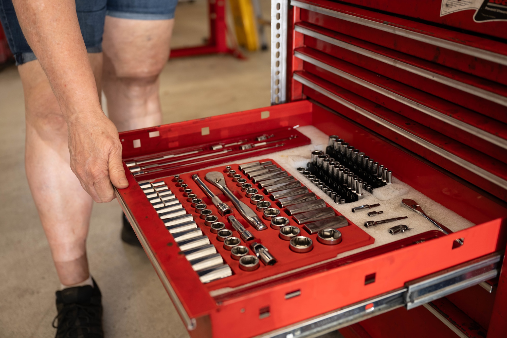 Joan Parcher, 1st Special Operations Force Support Squadron Auto Hobby operations clerk, opens a tool chest at Hurlburt Field, Florida, Oct. 29, 2024.