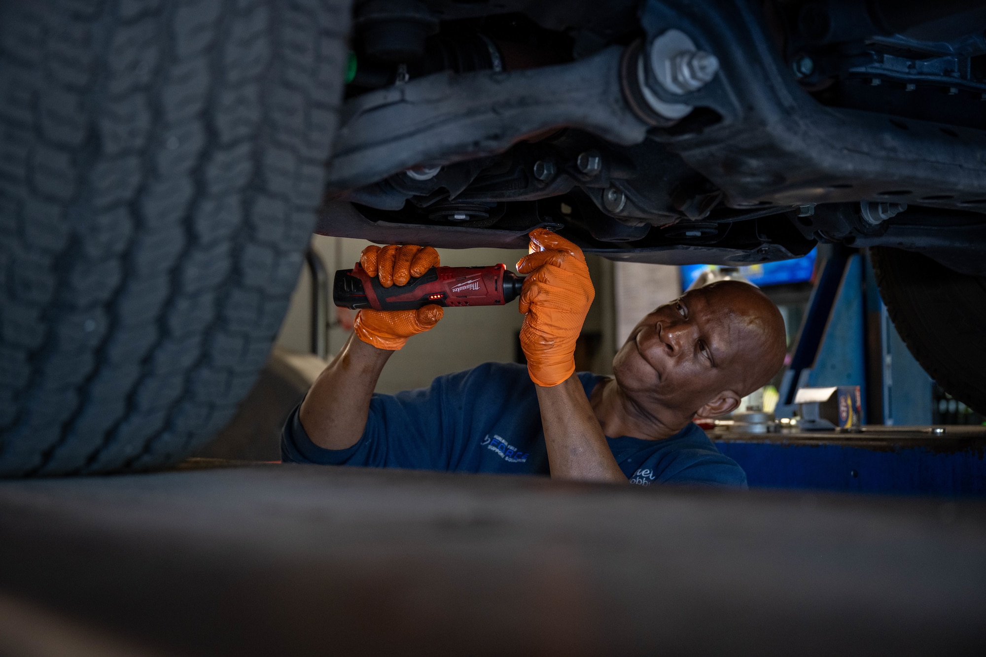 Michael Bailey, 1st Special Operations Force Support Squadron Auto Hobby manager, uses an angled drill to tighten a bolt at Hurlburt Field, Florida, Oct. 29, 2024.