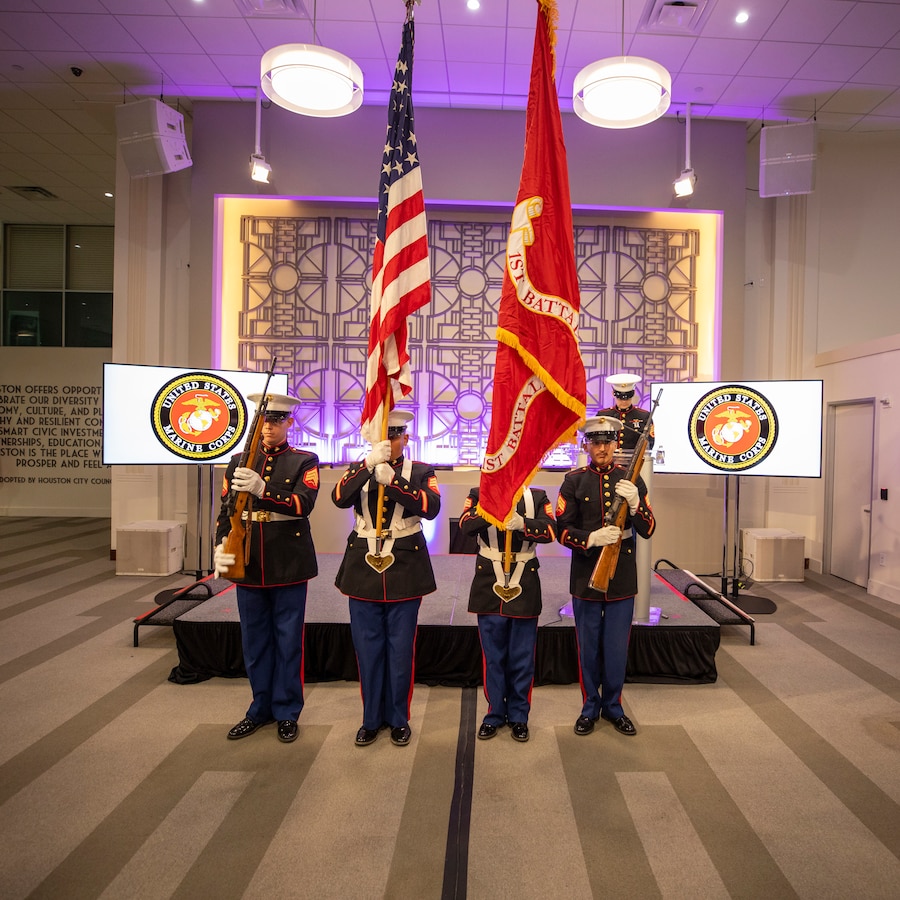 U.S. Marines with 1st Battalion, 23rd Marine Regiment color guard, present the colors during the city of Houston's 249th Marine Corps birthday celebration at Houston City Hall, Houston, Texas, Nov. 5, 2024. Marines with 1st Battalion served as the color guard and Marines with Recruiting Station Houston, 8th Marine Corps District served as the cake detail. (U.S. Marine Corps photo by Sgt. Ryan H. Pulliam)