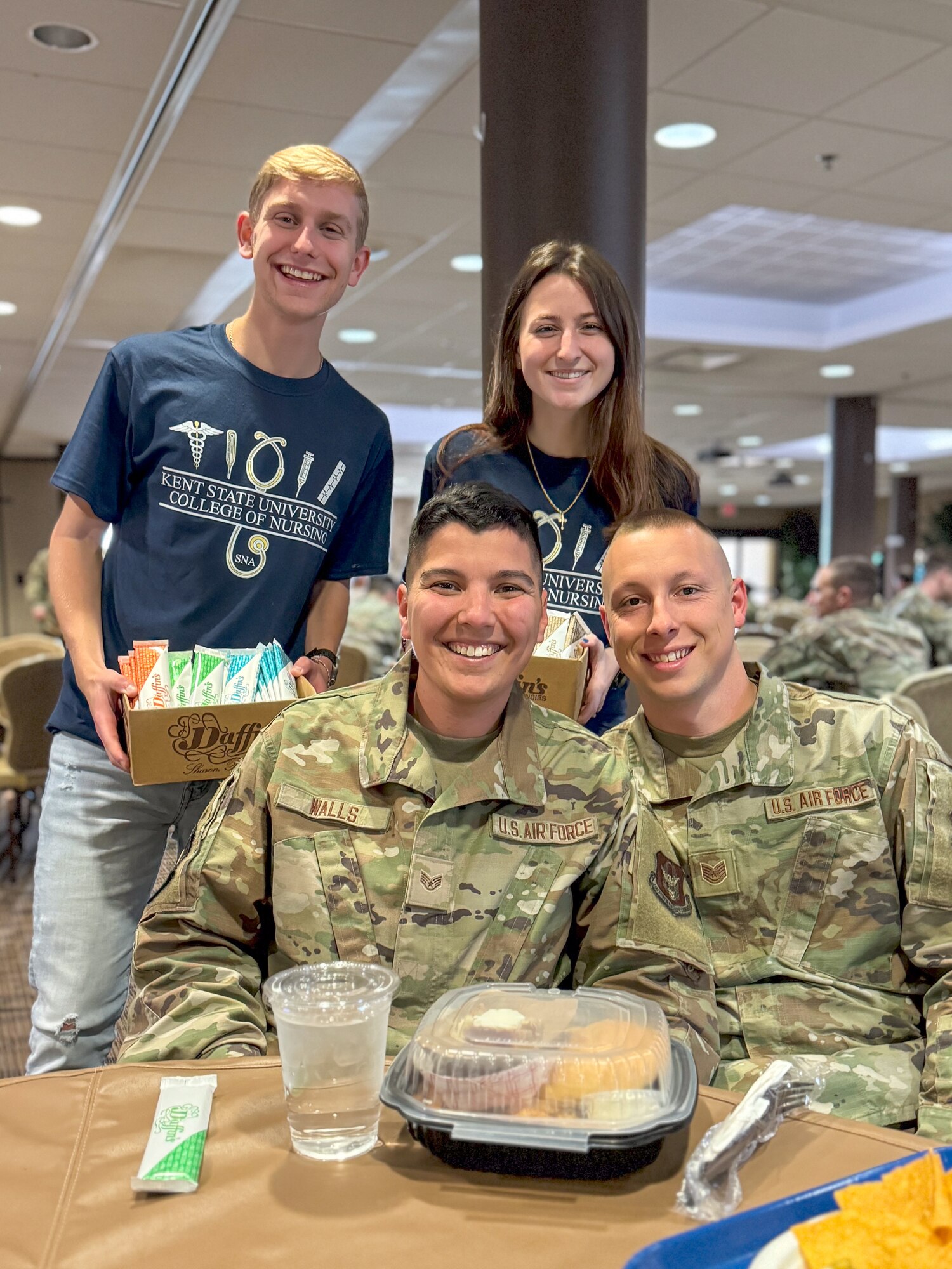 Citizen Airmen from the 910th Airlift Wing pose for a photo with nursing students from Kent State University Trumbull campus at Youngstown Air Reserve Station, Ohio, Nov. 2, 2024.