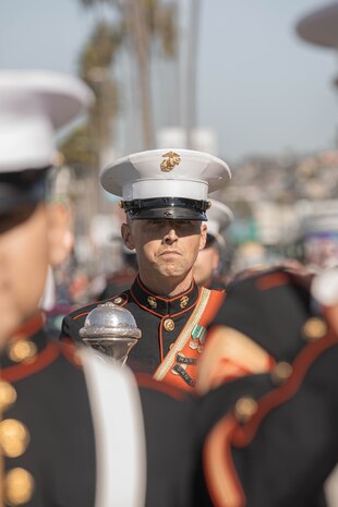 U.S. Marines Corps Gunnery Sgt. Weasley O. Hayes, drum major, Marine Band San Diego, marches in the San Diego Veterans Day Parade in San Diego, California, Nov. 11, 2024. The Marine Band San Diego’s job is to support the Recruit Training Regiment and other depot organizations. Marine Band San Diego performs a wide variety of music at military ceremonies and civilian events throughout San Diego County and the southwestern United States. (U.S. Marine Corps photo by Cpl. Alexandra M. Earl)