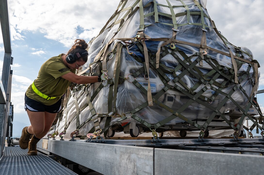 A 612th Air Base Squadron Airman unloads cargo from a C-5M Super Galaxy from Dover Air Force Base, Delaware, at Soto Cano Air Base, Honduras, Nov. 8, 2024.