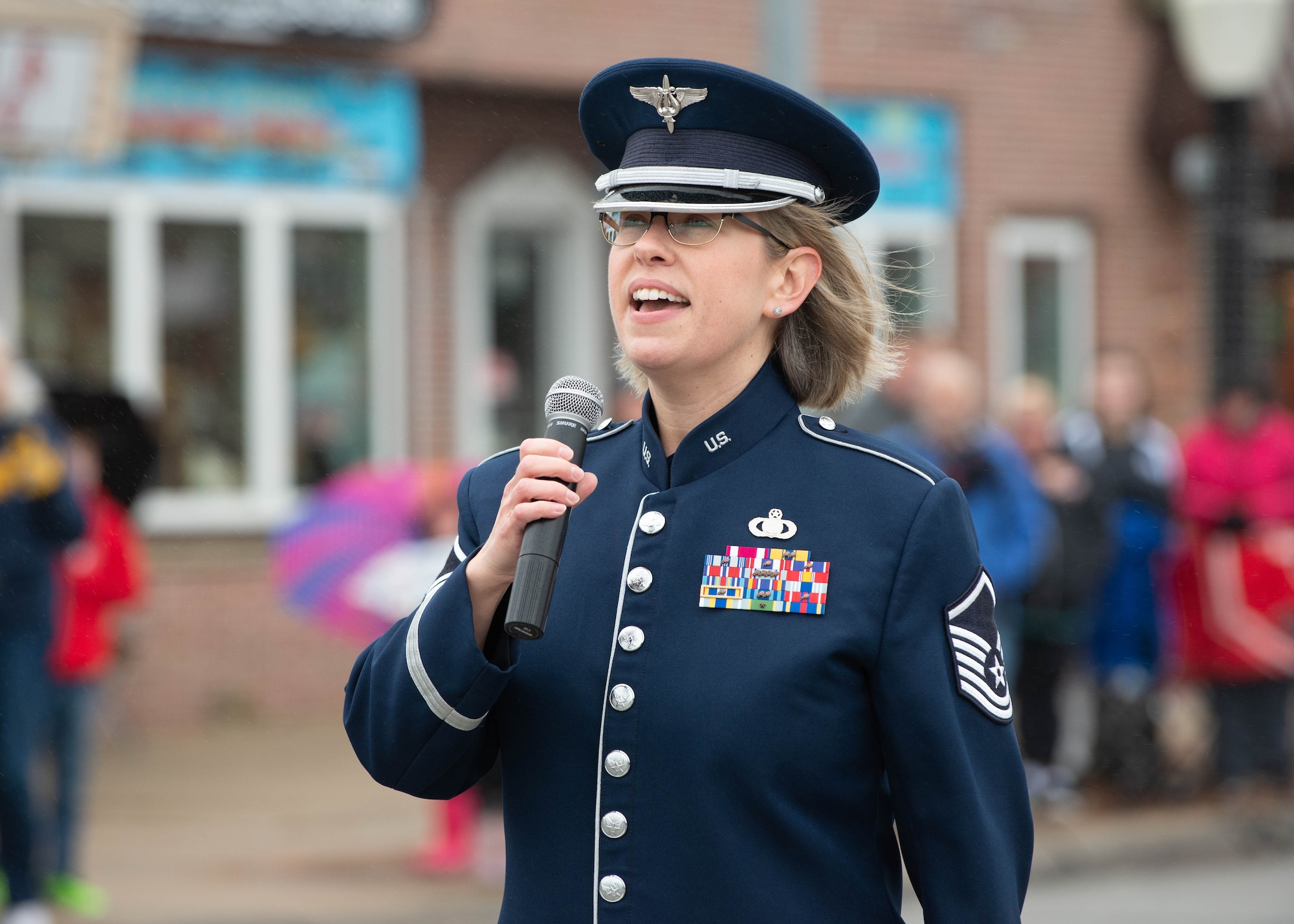 Woman singing at Veterans day parade