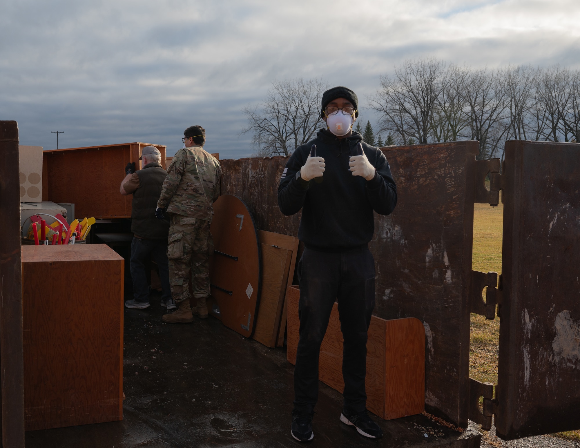 A volunteer from the 319th Reconnaissance Wing poses for a photo during the Carl Ben Eielson School clean-up at Grand Forks Air Force Base, North Dakota, Nov. 4, 2024