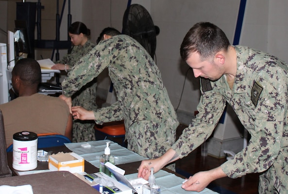 Naval Health Clinic Patuxent River staff administer influenza vaccinations during the 2024 FluShotex.