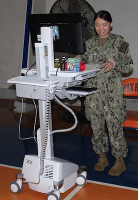 Naval Health Clinic Patuxent River staff administer influenza vaccinations during the 2024 FluShotex.