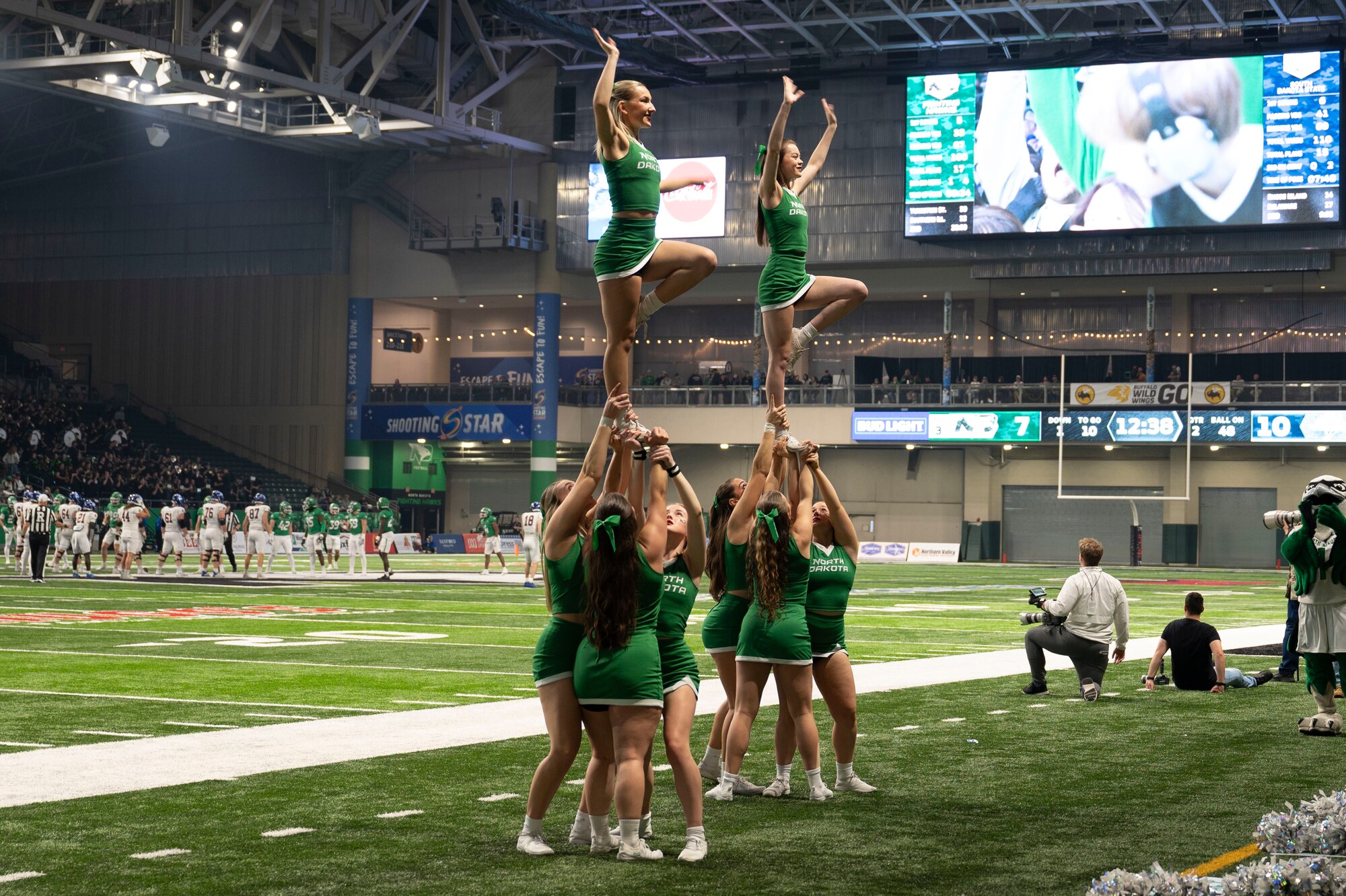 University of North Dakota cheerleaders perform during the annual military appreciation day at the Alerus Center in Grand Forks, North Dakota, Nov. 9, 2024.