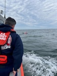 A Coast Guard Station Jones Beach crew rescues three individuals from the water after their vessel sank near the SS Iberia shipwreck off the coast of Suffolk County, New York, Nov. 10, 2024. Station Jones Beach responded despite being part of the Force Alignment Initiative Station Impacts, demonstrating the Coast Guard’s layered search and rescue approach in coordination with local and state partners. The survivors were transported to a nearby marina for medical evaluation. (U.S. Coast Guard courtesy asset)