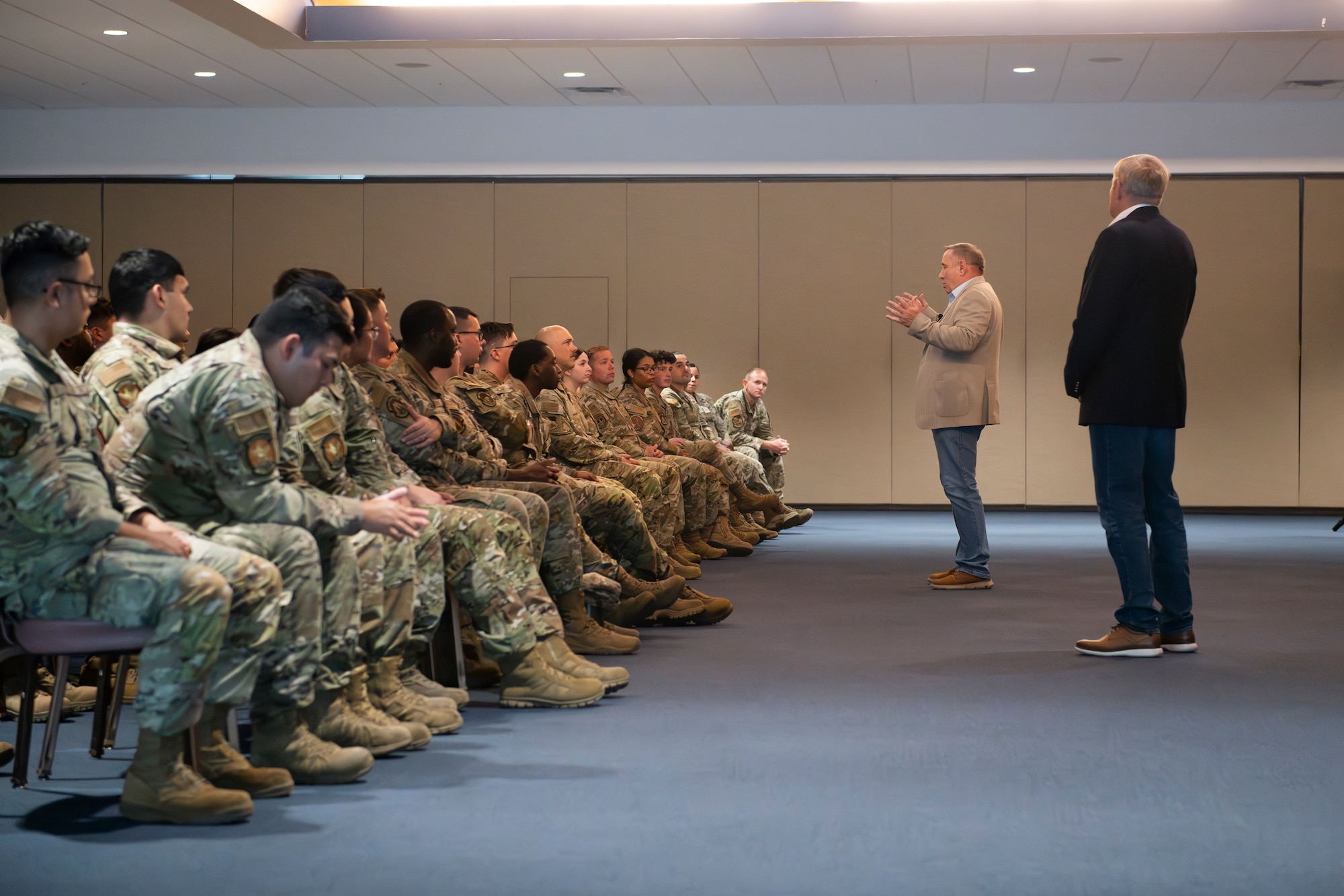 Guest speakers talk to Airmen.