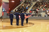 Waller High School Junior Reserve Officers’ Training Corps members fold the American Flag during a Veterans Day program on Nov. 11, 2024.