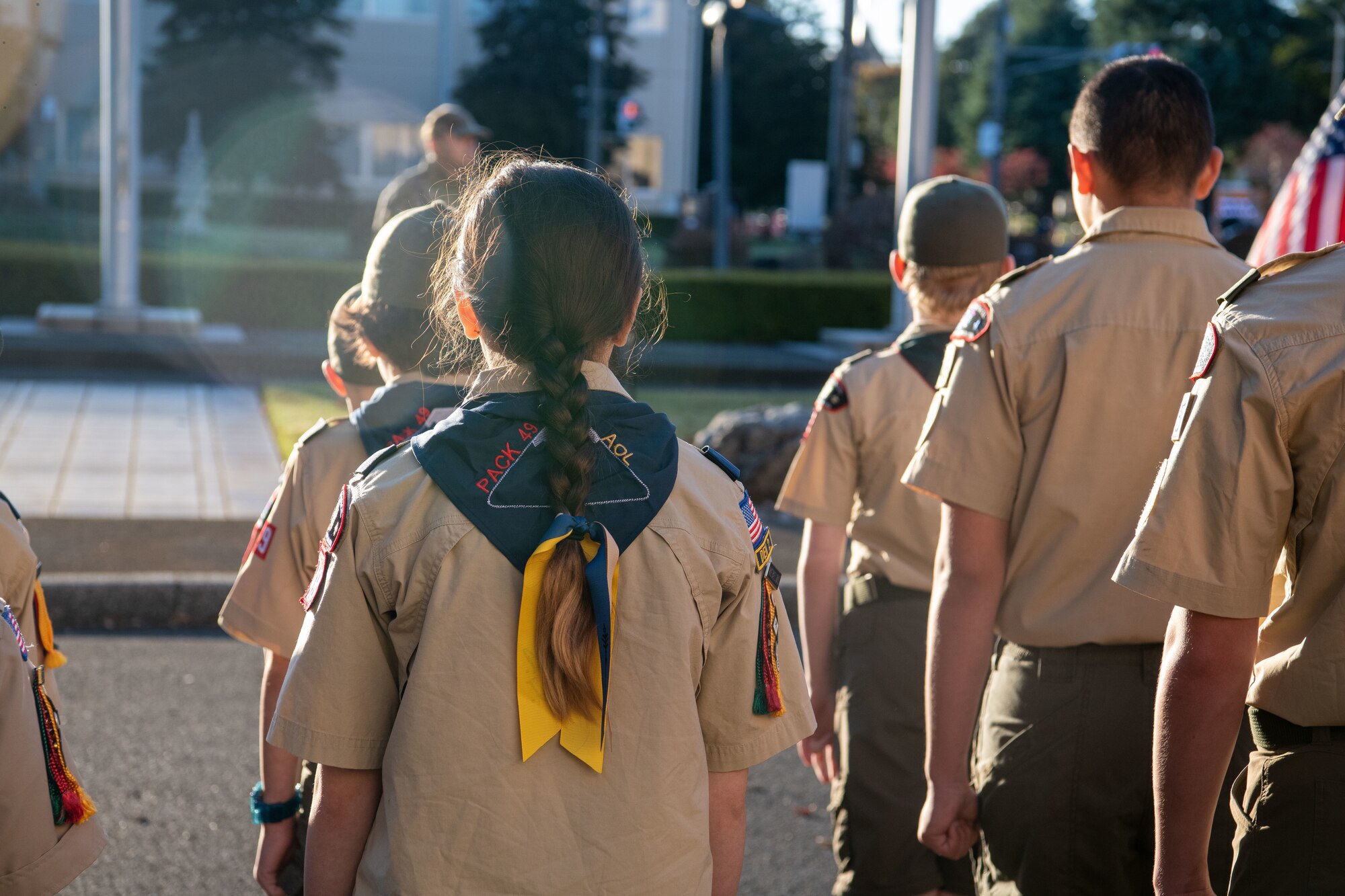 Yokota Cub Scouts stand in formation during a Veterans Day ceremony at Yokota