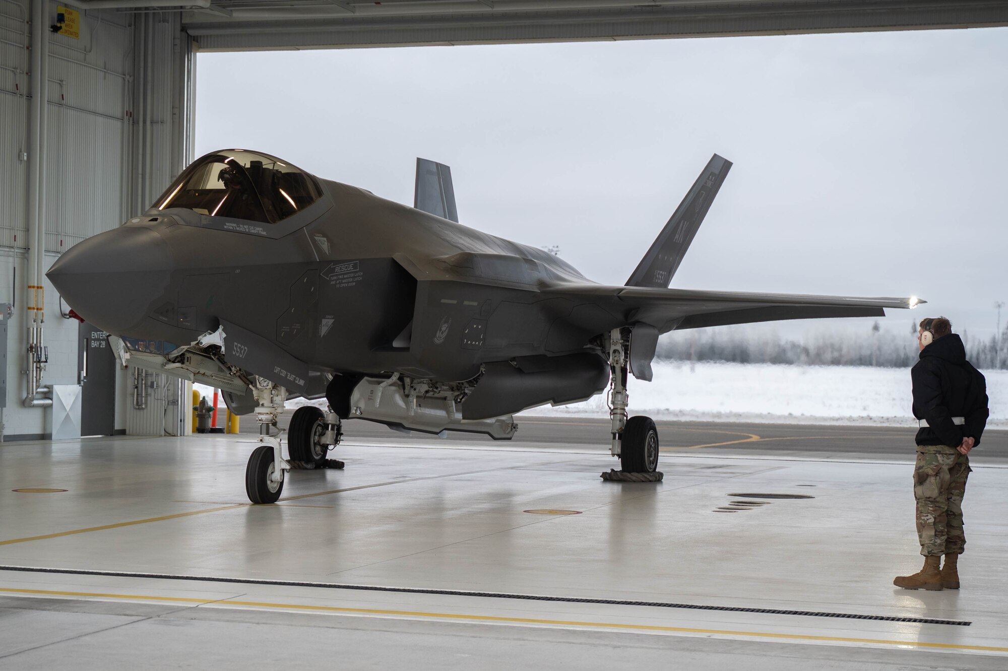 An F-35A Lightning II assigned to the 355th Fighter Squadron awaits takeoff in a weather shelter at Eielson Air Force Base, Alaska, Nov. 13, 2024.
