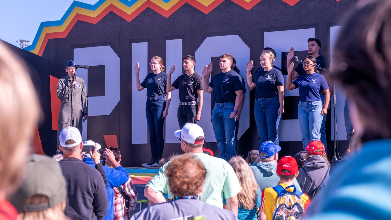 Members of the Delayed Entry Program are sworn in to the U.S. Air Force during the NASCAR Championship pre-race events November 10, 2024, at Phoenix Raceway in Avondale, Arizona.