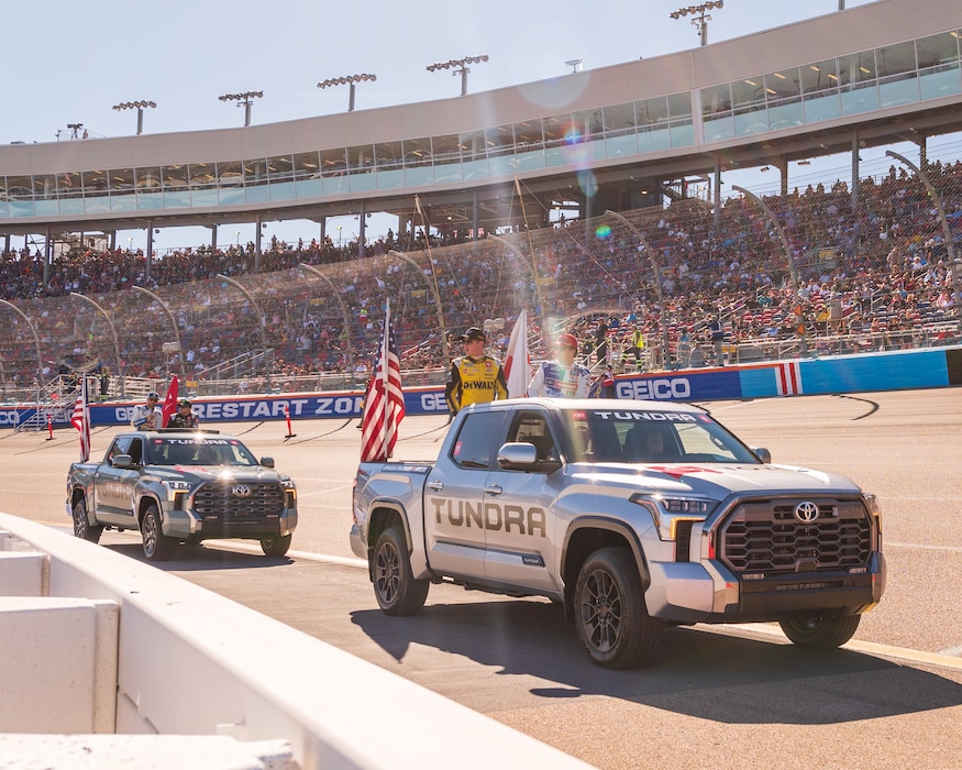 56th Fighter Wing Airmen drive NASCAR racecar drivers as a part of a parade during the NASCAR Championship pre-race events November 10, 2024, at Phoenix Raceway in Avondale, Arizona.