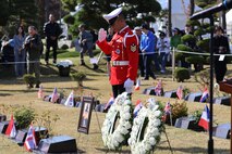 Thailand Army Sgt. Chamadon Wiriwatt renders a salute to late Thai Korean War veteran Cpl. Rod Asanapan during interment ceremony at the United Nations Memorial Cemetery in Busan, Nov. 11. Asanapan is the first Thai veteran to be interred at the cemetery.
