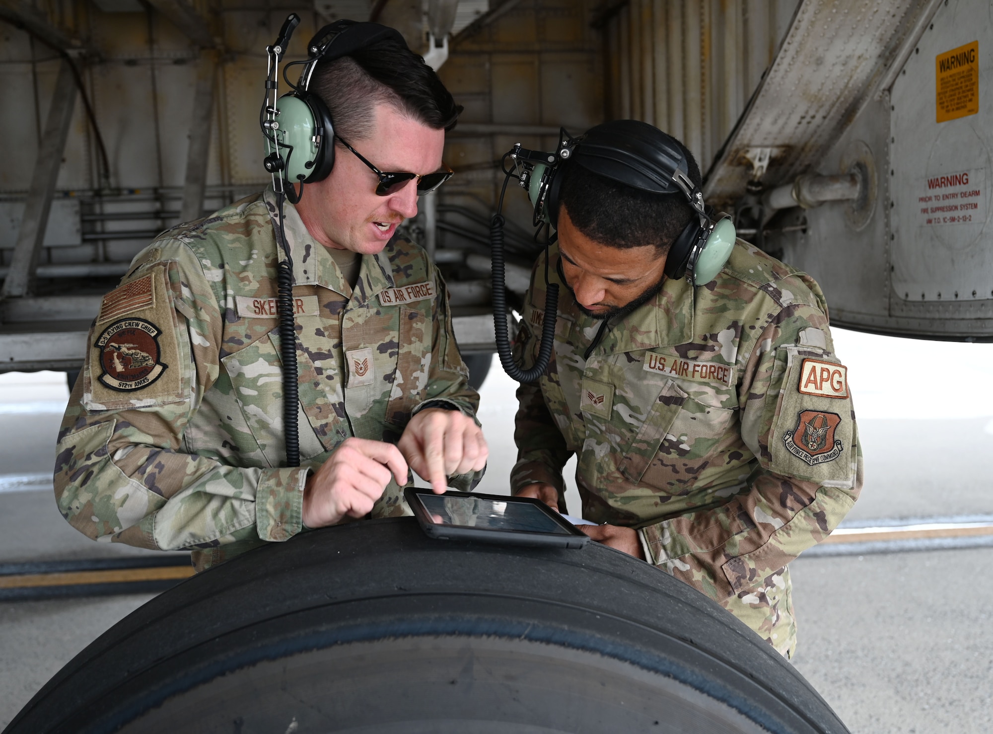 Crew chiefs inspect aircraft