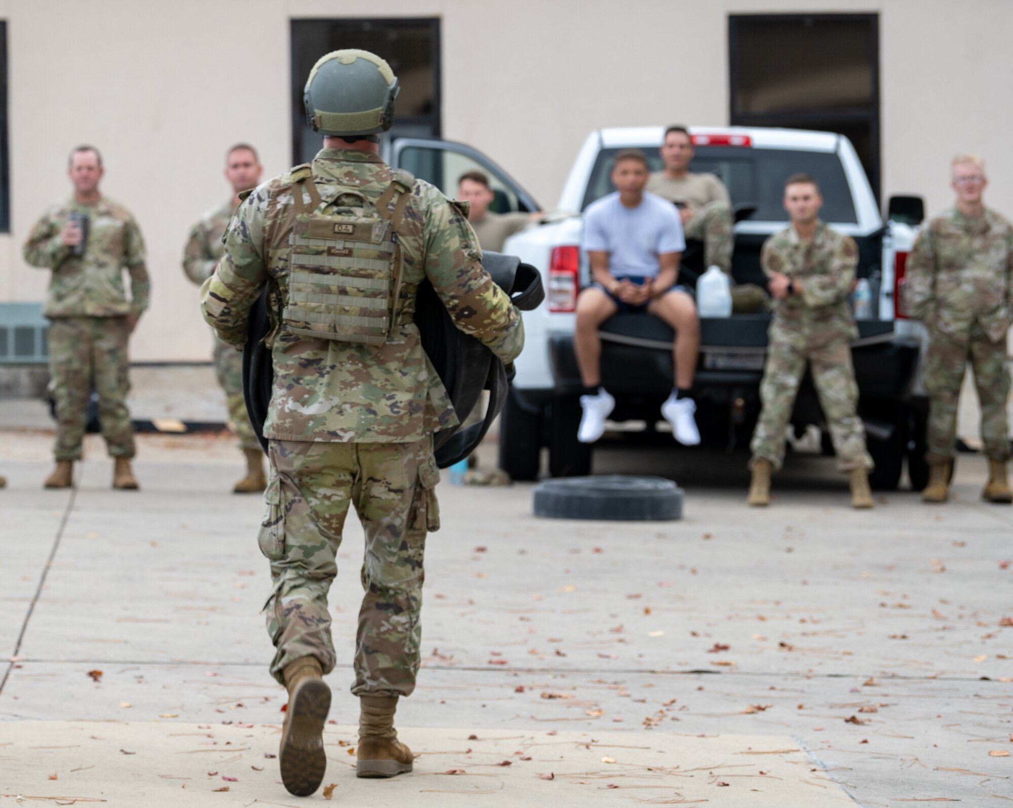 An Air Commando from the 1st Special Operations Logistics Readiness Squadron carries a refueling hose during a Forward Area Refueling Point tryout at Hurlburt Field, Florida, Oct. 31, 2024.