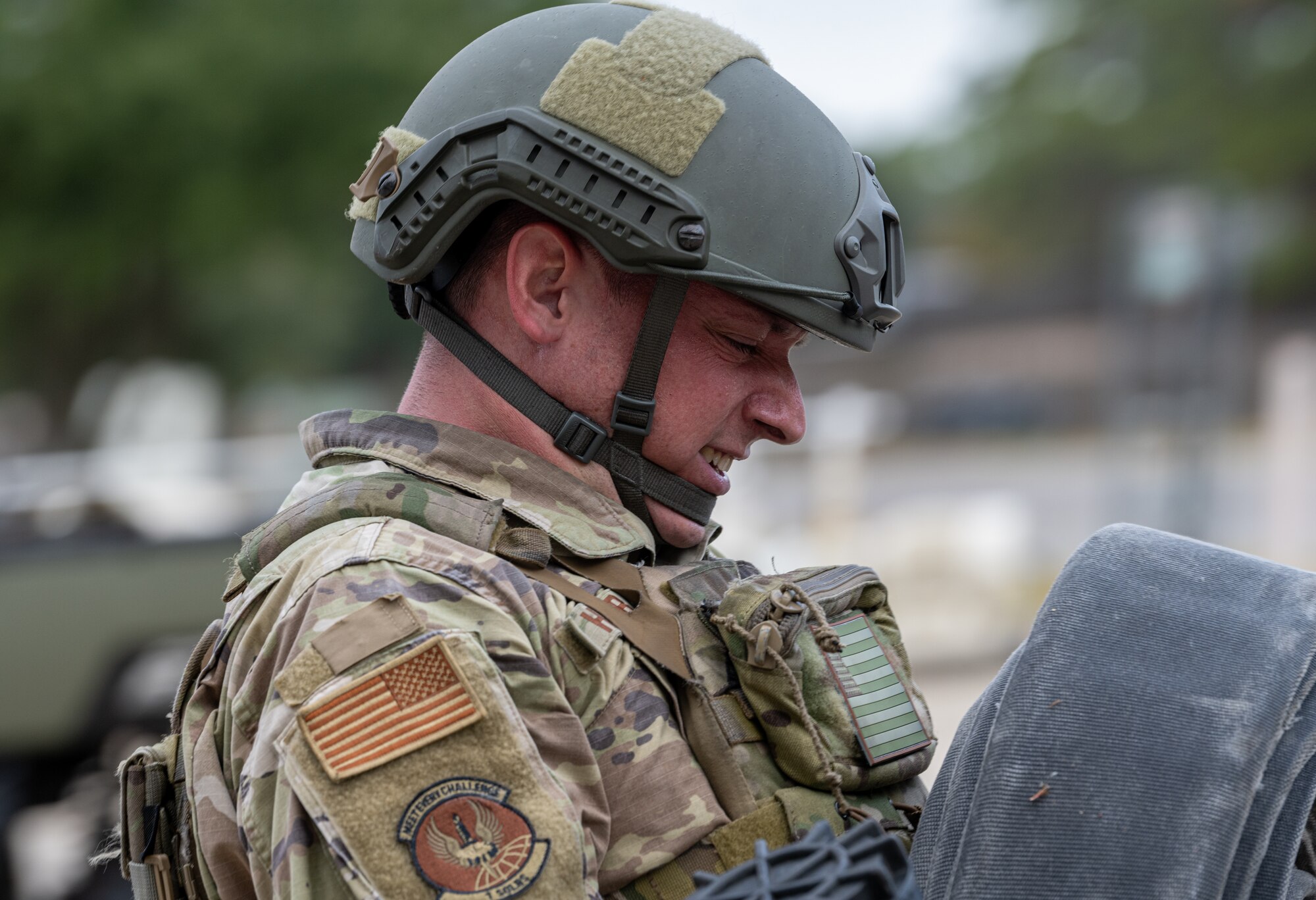 An Air Commando assigned to the 1st Special Operations Logistics Readiness Squadron carries a refueling hose at Hurlburt Field, Florida, Oct. 31, 2024.
