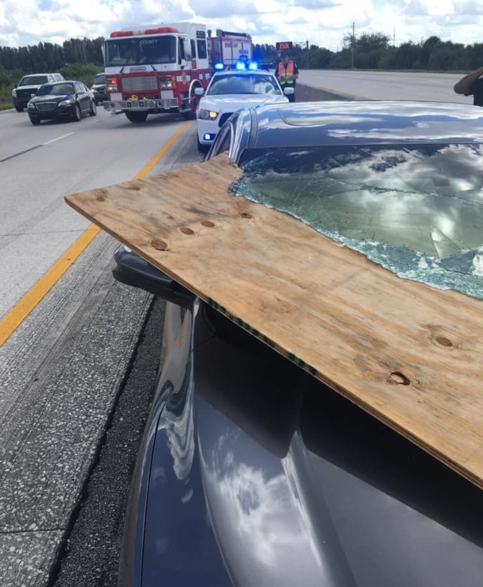 A piece of plywood flew off a truck and smashed through this car’s windshield on Interstate 95 near Rockledge, Fla., but miraculously, no one was injured. Unsecured items can become lethal flying debris when driving, especially at higher speeds on highways.