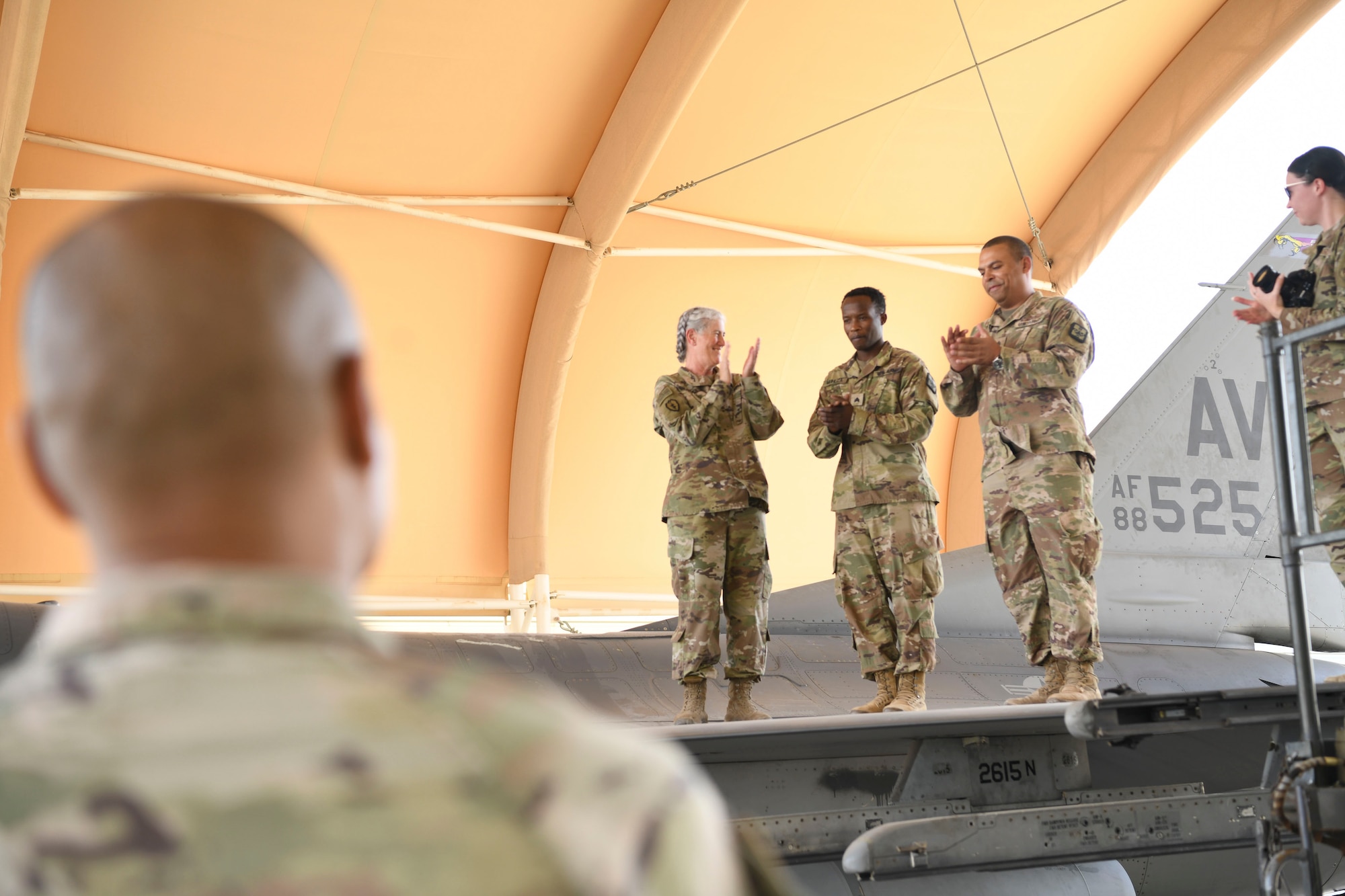 U.S. Army Sgt. Aimable Muhuza, 401st Medical Logistics Company medical logistics manager, receives applause after his promotion ceremony in the U.S. Central Command area of responsibility, Oct. 22, 2024.