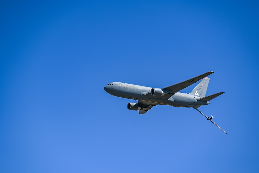 A KC-46 Pegasus aircraft from Altus Air Force Base, Oklahoma, executes a fly-over at The Wings and Warriors Fly-In at San Marcos, Texas, Nov. 9, 2024. The demo team showcased the KC-46’s air refueling and slow-speed maneuvering capabilities by executing a high-speed pass with the boom deployed at 500 feet, followed by a pass with the gear and flaps down. (U.S. Air Force photo by Airman 1st Class Jonah Bliss)