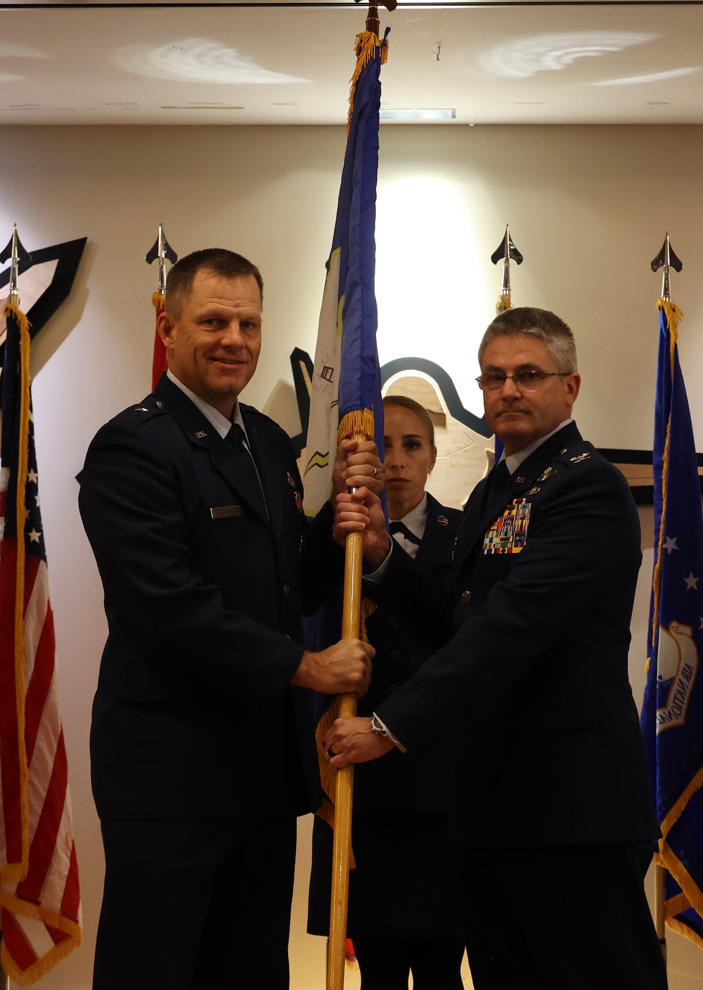Brig. Gen. Coffey passes the flag to Col Slaughter during the 101st AOG Assumption of Command.
