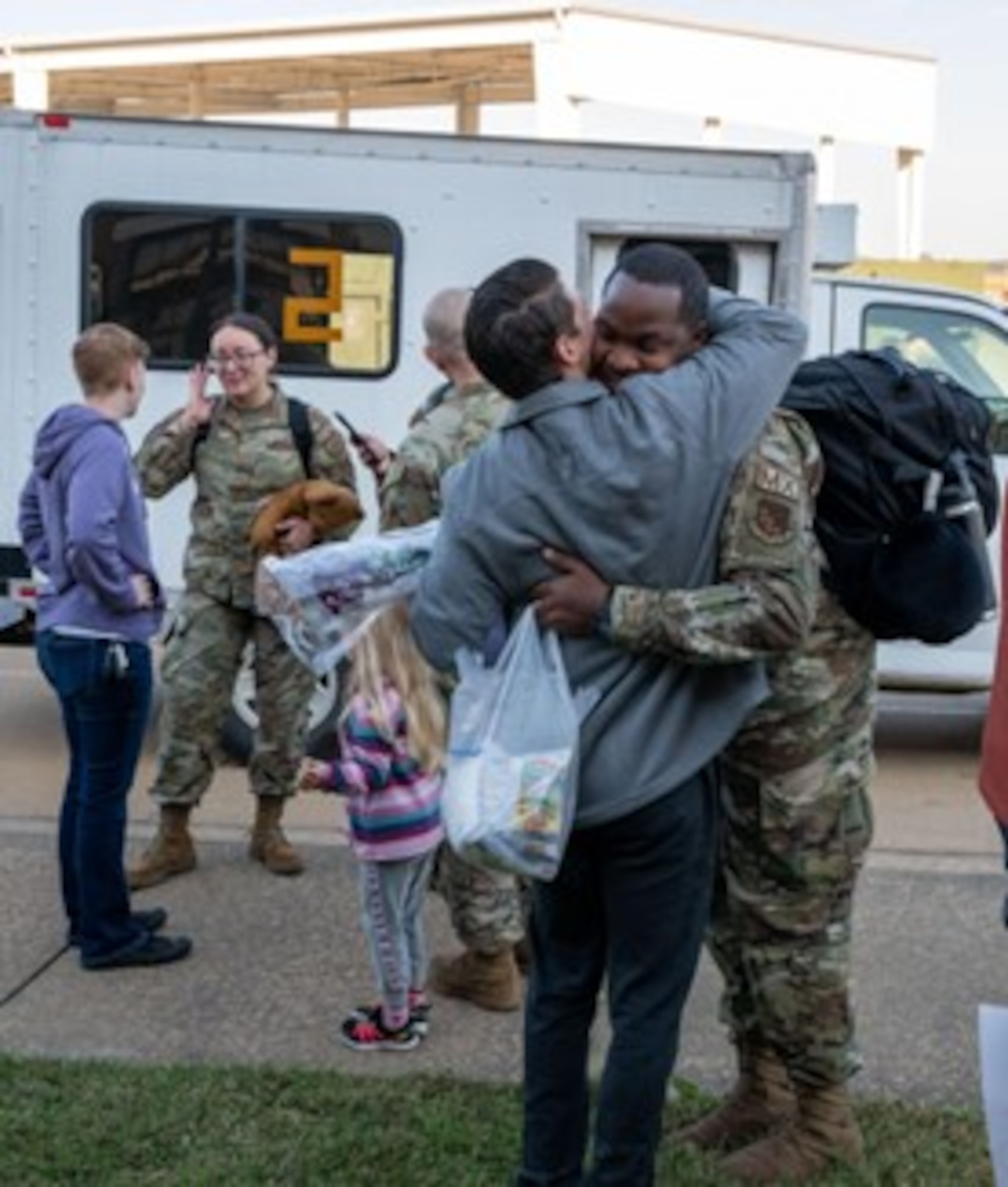 Airman hugs family member. (U.S. Air Force photo by Airman Donnell Ramsey)