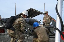 U.S. Air Force Airmen check munitions being assembled during training at the Air Force Combat Ammunition Center (AFCOMAC) on Beale Air Force Base, California, Nov. 5, 2024.