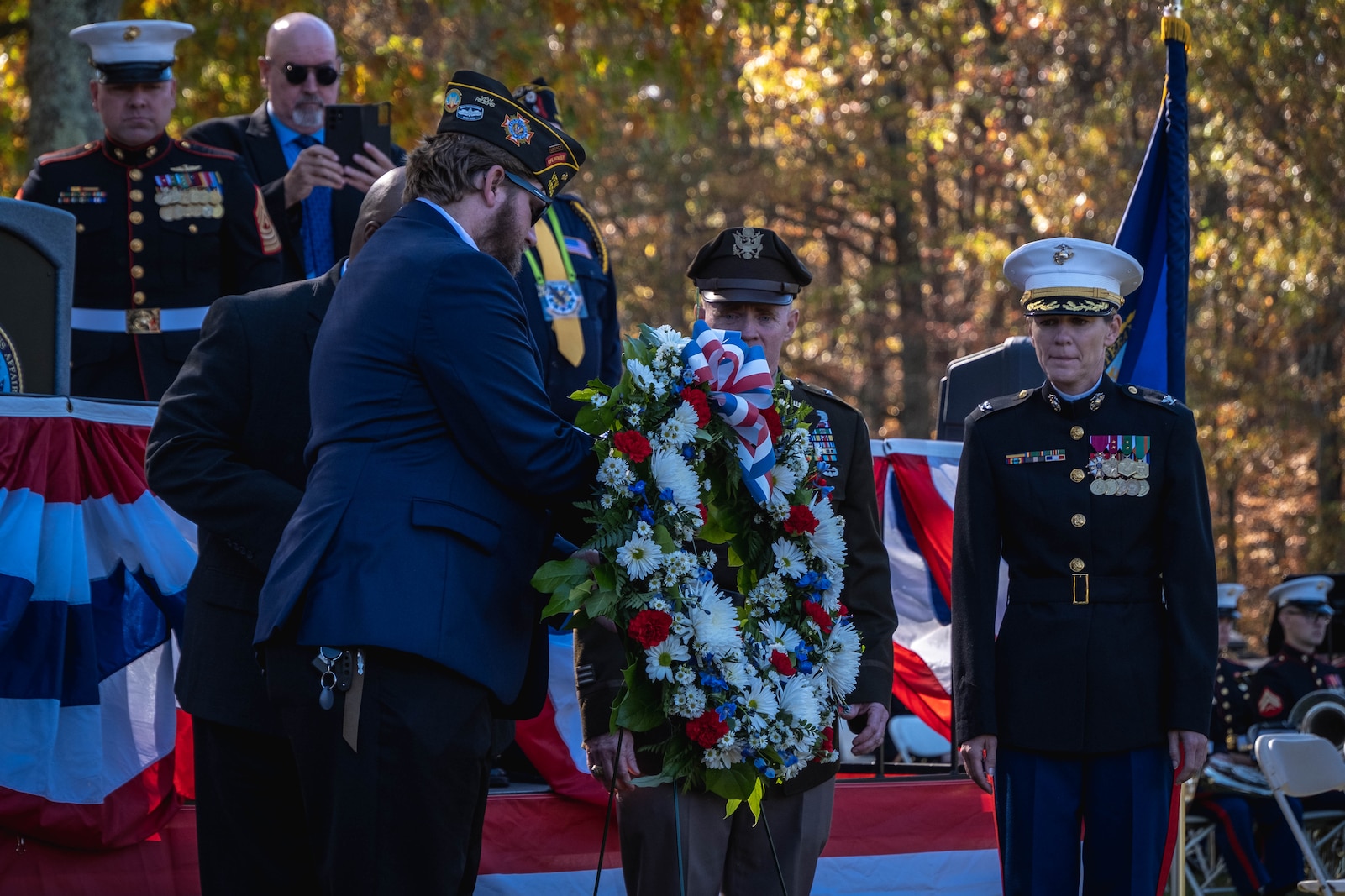 U.S. service members and veterans present the wreath during the Veterans Day Wreath Laying Ceremony at the National Cemetery at Quantico, Virginia, Nov. 11, 2024. Veterans Day is a federal holiday observed on November 11 of each year in honor of all veterans who have served in the U.S Armed Forces. (U.S. Marine Corps photo by Lance Cpl. Joaquin Dela Torre)