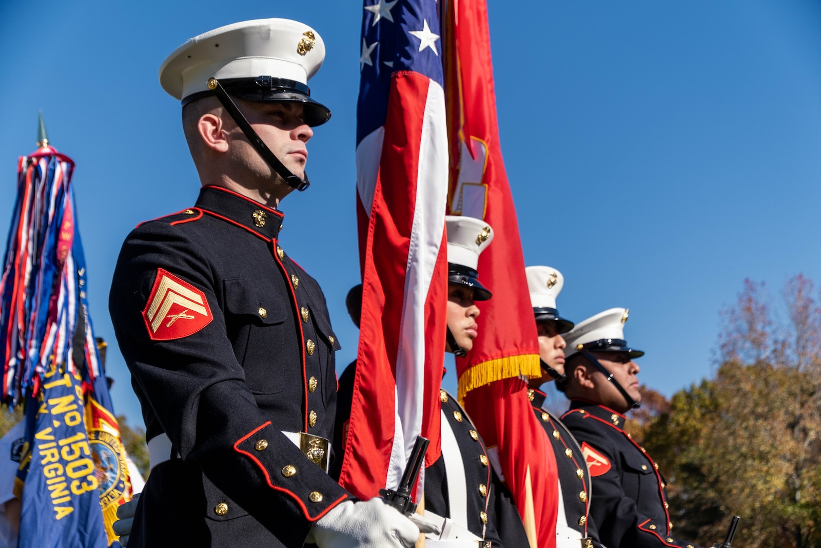 U.S. Marines with the Marine Corps Base Quantico color guard stand in formation during the Veterans Day Wreath Laying Ceremony at the National Cemetery at Quantico, Virginia, Nov. 11, 2024. Veterans Day is a federal holiday observed on November 11 of each year in honor of all veterans who have served in the U.S Armed Forces. (U.S. Marine Corps photo by Lance Cpl. Joaquin Dela Torre)