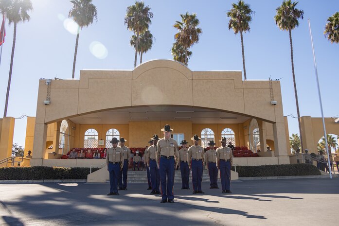 U.S. Marine Corps staff with Hotel Company, 2nd Recruit Training Battalion, stand in formation during a graduation ceremony at Marine Corps Recruit Depot San Diego, California, Nov. 8, 2024. This ceremony marked the end of a 13-week transformation that included training in drill, marksmanship, basic combat skills, and Marine Corps customs and traditions. (U.S. Marine Corps photo by Lance Cpl. Janell B. Alvarez)
