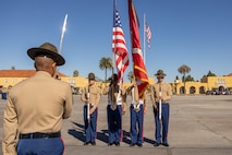 U.S. Marines assigned to the Recruit Training Regiment Color Guard, Marine Corps Recruit Depot San Diego, present the colors during the Hotel Company, 2nd Recruit Training Battalion graduation ceremony at MCRD San Diego, California, Nov. 8, 2024. This ceremony marked the end of a 13-week transformation that included training in drill, marksmanship, basic combat skills, and Marine Corps customs and traditions. (U.S. Marine Corps photo by Lance Cpl. Janell B. Alvarez)