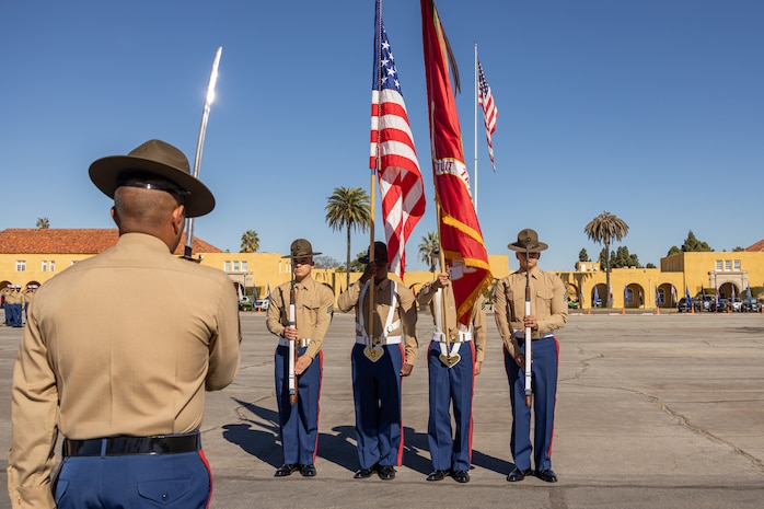 U.S. Marines assigned to the Recruit Training Regiment Color Guard, Marine Corps Recruit Depot San Diego, present the colors during the Hotel Company, 2nd Recruit Training Battalion graduation ceremony at MCRD San Diego, California, Nov. 8, 2024. This ceremony marked the end of a 13-week transformation that included training in drill, marksmanship, basic combat skills, and Marine Corps customs and traditions. (U.S. Marine Corps photo by Lance Cpl. Janell B. Alvarez)