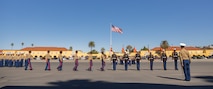 U.S. Marine Corps drill instructors and guides with Hotel Company, 2nd Recruit Training Battalion, march in formation prior to returning the guidons during a graduation ceremony at Marine Corps Recruit Depot San Diego, California, Nov. 8, 2024. This ceremony marked the end of a 13-week transformation that included training in drill, marksmanship, basic combat skills, and Marine Corps customs and traditions. (U.S. Marine Corps photo by Lance Cpl. Janell B. Alvarez)