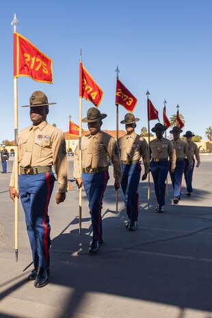 U.S. Marine Corps drill instructors with Hotel Company, 2nd Recruit Training Battalion, march in formation after to returning the guidon during a graduation ceremony at Marine Corps Recruit Depot San Diego, California, Nov. 8, 2024. This ceremony marked the end of a 13-week transformation that included training in drill, marksmanship, basic combat skills, and Marine Corps customs and traditions. (U.S. Marine Corps photo by Lance Cpl. Janell B. Alvarez)