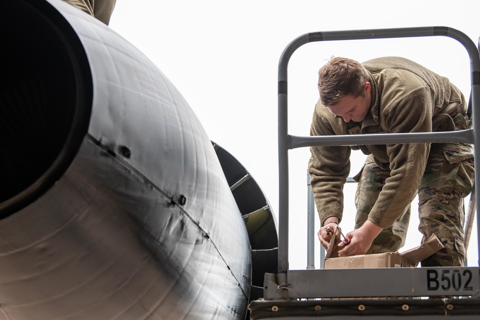 Airman performs a post flight inspection on a B-52H Stratofortress