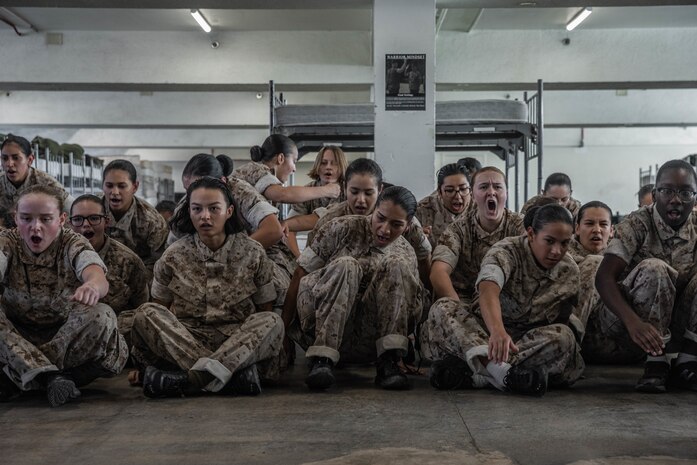 New U.S. Marine Corps recruits with Lima Company, 3rd Recruit Training Battalion, sit in the squad bays prior to meeting their drill instructors as part of a pick-up event at Marine Corps Recruit Depot San Diego, California, Oct. 25, 2024. Pick-up day signifies the first official day of training in which recruits will meet their drill instructor team for the first time, prepare their gear and squad bay, and expectations are set for the remainder of their time in recruit training. (U.S. Marine Corps photo by Cpl. Alexandra M. Earl)
