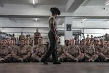 U.S. Marine Corps Senior Drill Instructor Sgt. Aleeha Ivory with Lima Company, 3rd Recruit Training Battalion, affirms the senior drill instructor creed as part of a pick-up event at Marine Corps Recruit Depot San Diego, California, Oct. 25, 2024. Pick-up day signifies the first official day of training in which recruits will meet their drill instructor team for the first time, prepare their gear and squad bay, and expectations are set for the remainder of their time in recruit training. (U.S. Marine Corps photo by Cpl. Alexandra M. Earl)