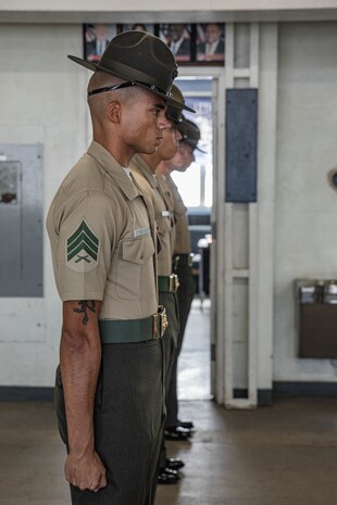U.S. Marine Corps Sgt. Justin Hamlett, a drill instructor with Lima Company, 3rd Recruit Training Battalion, is introduced to the new recruits as part of a pick-up event at Marine Corps Recruit Depot San Diego, California, Oct. 25, 2024. Pick-up day signifies the first official day of training in which recruits will meet their drill instructor team for the first time, prepare their gear and squad bay, and expectations are set for the remainder of their time in recruit training. (U.S. Marine Corps photo by Cpl. Alexandra M. Earl)