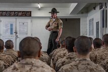U.S. Marine Corps Senior Drill Instructor Staff Sgt. Jordan Rivera with Lima Company, 3rd Recruit Training Battalion, affirms the senior drill instructor creed as part of a pick-up event at Marine Corps Recruit Depot San Diego, California, Oct. 25, 2024. Pick-up day signifies the first official day of training in which recruits will meet their drill instructor team for the first time, prepare their gear and squad bay, and expectations are set for the remainder of their time in recruit training. (U.S. Marine Corps photo by Cpl. Alexandra M. Earl)