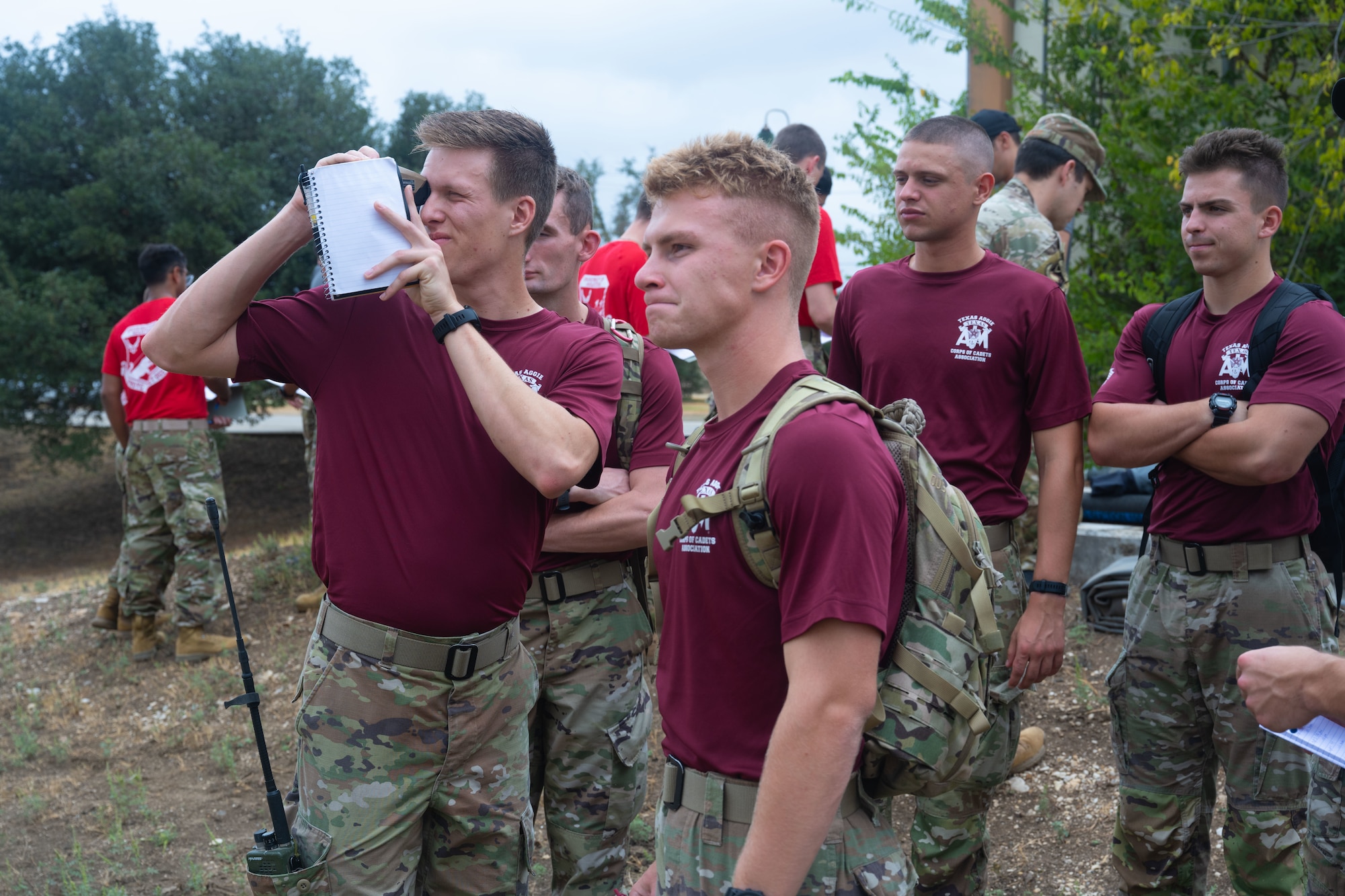 AFROTC cadets work together looking downrange in a simulated precision strike exercise.