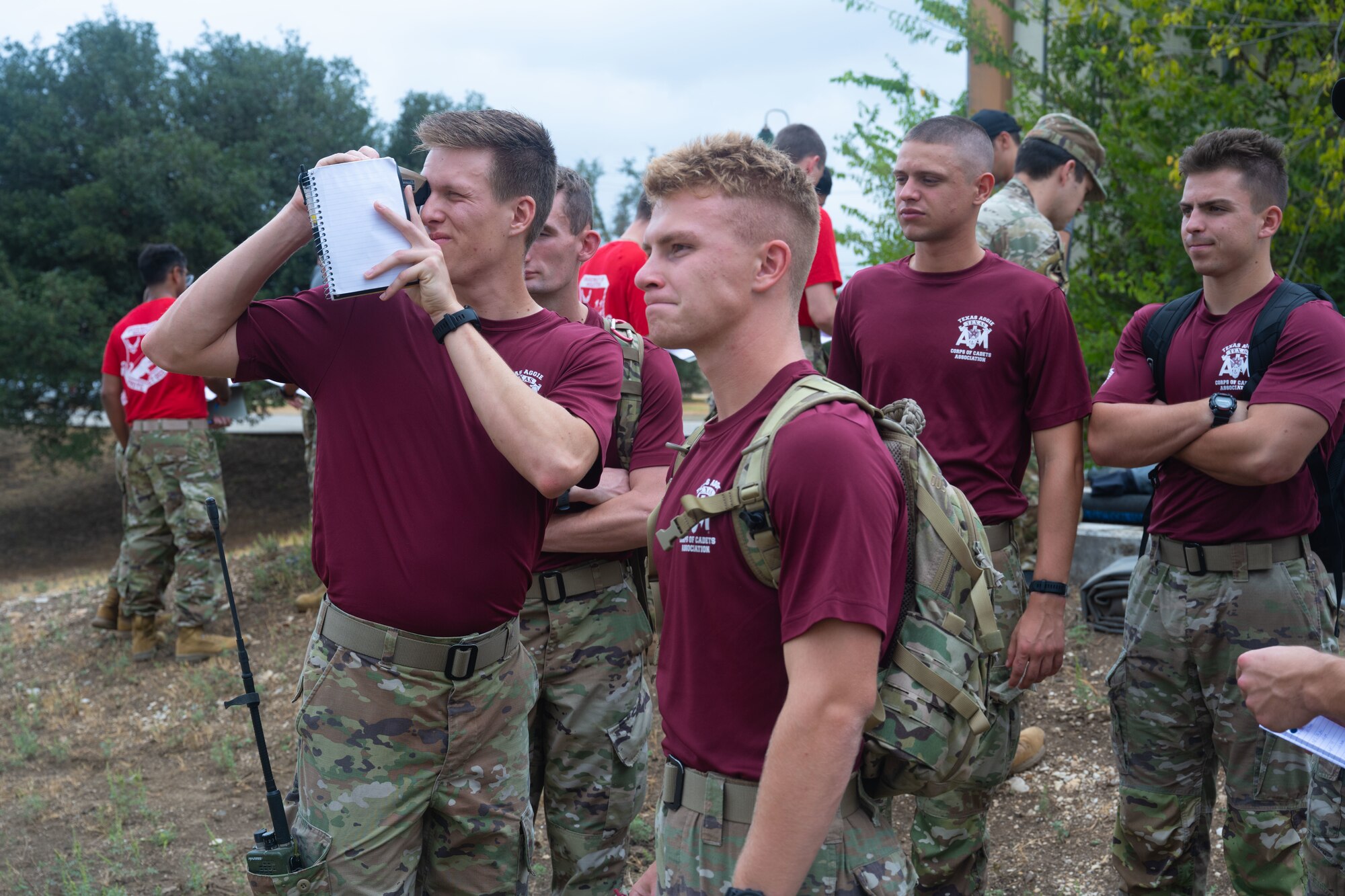 AFROTC cadets work together looking downrange in a simulated precision strike exercise.