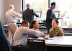 Aviation and Missile Commander Maj. Gen. Lori Robinson engages in personal conversations with attendees during a Heroes Week breakfast honoring veterans, held Nov. 8 in Huntsville, Ala.