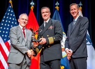 241107-N-HL559-0332 WASHINGTON -- Capt. Jonathan J. Haase (center), one of seven Naval Sea Systems Command (NAVSEA) acquisition professionals was recognized Nov. 8 at the Pentagon for outstanding acquisition practices during the 2024 Department of the Navy Acquisition Excellence Awards ceremony.