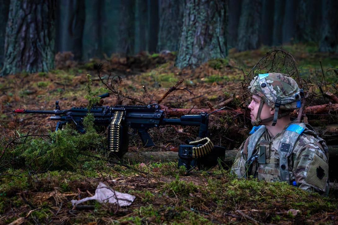 U.S. Army Spc. Brad Clark, an infantryman assigned to 1st Battalion, 109th Infantry Regiment, 2nd Infantry Brigade Combat Team, 28th Infantry Division, Pennsylvania Army National Guard, preps for the impending fight during exercise Strong Griffin at Pabrade Training Area, Lithuania, Oct. 27, 2024. Soldiers from 1st Bn., 109th Inf. Regt. spent their two-week annual training period augmenting the 1st Cavalry Division forces participating in Strong Griffin – a Lithuanian-led NATO field exercise focused on training Lithuanian forces and enhancing interoperability with partner nation units. The 1st Cavalry Division’s mission in Europe is to engage in multinational training and exercises across the continent, working alongside NATO allies and regional security partners to provide competent and ready forces to V Corps, America’s forward-deployed corps in Europe (U.S. Army photo by Spc. Trey Gonzales)