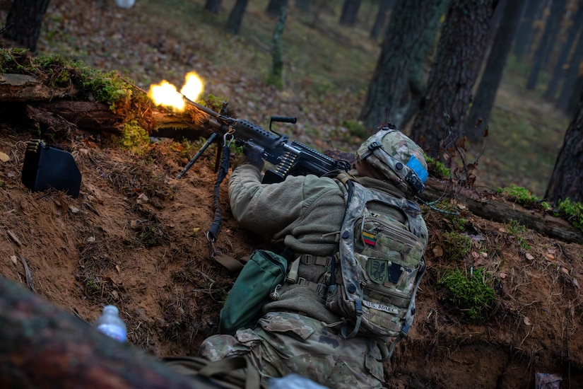 U.S. Army Spc. Ray Ortiz, an infantryman assigned to 1st Battalion, 109th Infantry Regiment, 2nd Infantry Brigade Combat Team, 28th Infantry Division, Pennsylvania Army National Guard, defends his post during exercise Strong Griffin at Pabrade Training Area, Lithuania, Oct. 27, 2024. Soldiers from 1st Bn., 109th Inf. Regt. spent their two-week annual training period augmenting the 1st Cavalry Division forces participating in Strong Griffin – a Lithuanian-led NATO field exercise focused on training Lithuanian forces and enhancing interoperability with partner nation units. The 1st Cavalry Division’s mission in Europe is to engage in multinational training and exercises across the continent, working alongside NATO allies and regional security partners to provide competent and ready forces to V Corps, America’s forward-deployed corps in Europe (U.S. Army photo by Spc. Trey Gonzales)