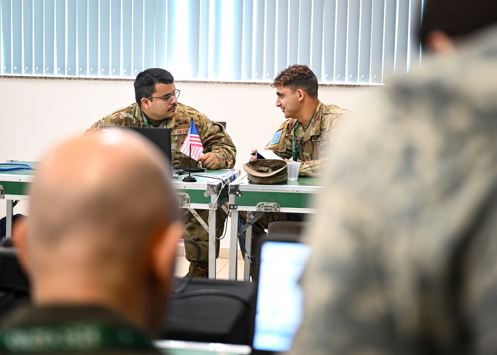 New York Air National Guard 107th Attack Wing space systems operators work through a space scenario during CRUZEX CYBER at Natal Air Force Base, Brazil, Nov. 8, 2024. The training aims to fortify the resilience of critical military infrastructure and strengthen the strategic partnerships within the region. (U.S. Air Force photo by Staff Sgt. Madeline Herzog)