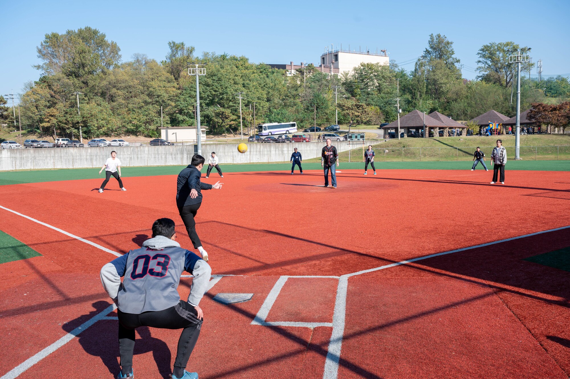 U.S. Air Force and Republic of Korea Air Force paralegal teams, play kickball during the annual legal friendship day at Osan Air Base, ROK, Nov. 7, 2024. Hosting duties rotate between the two nations to provide an opportunity to better exchange culture. (U.S. Air Force photo by Staff Sgt. Christopher Tam)